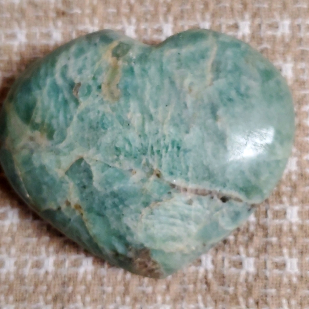 Amazonite healing heart Stone. Bluish green in color. It weighs just over 1 lb.